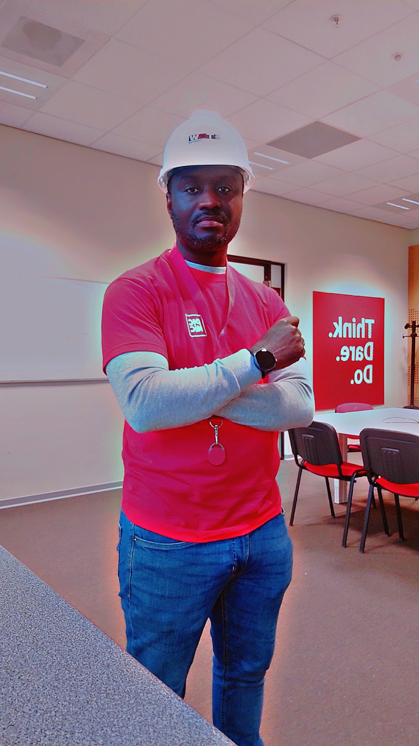 Ebenezer in a Picnic shirt and hard hat
